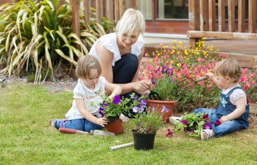 Worker following safe procedures during landscaping work